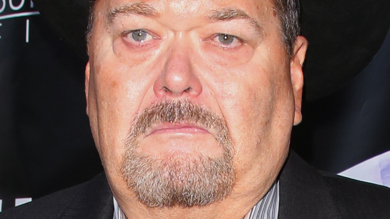 Jim Ross attends an event