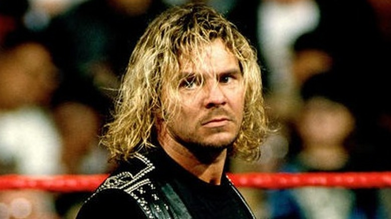 Brian Pillman Looks On From A WWE Ring 