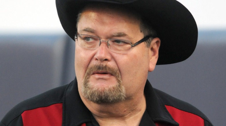 Jim Ross wearing glasses