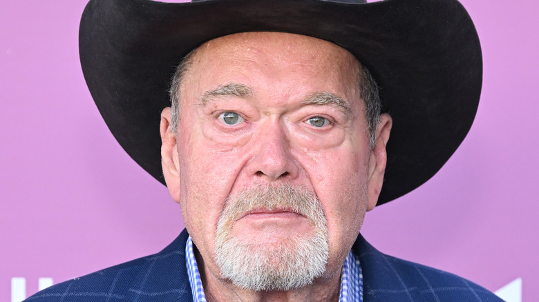 Jim ross wearing a cowboy hat