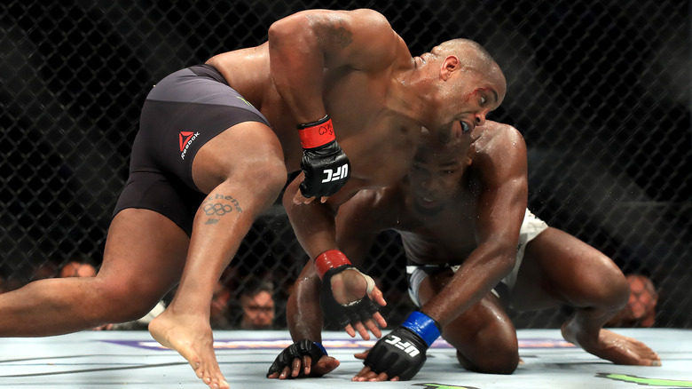 Cormier and Jones fighting