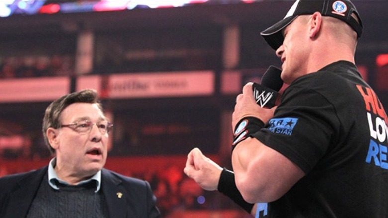 John Cena Sr. and John Cena Jr. share a moment together in the ring