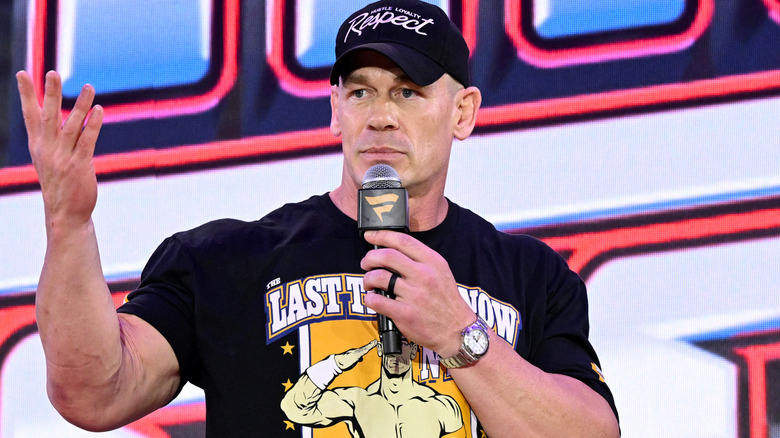 John Cena holding a microphone