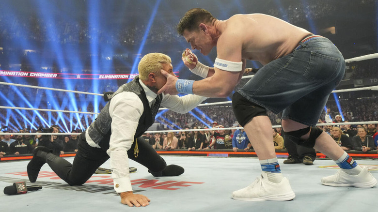 John Cena attacking Cody Rhodes