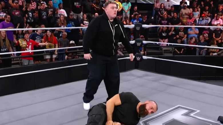 Will Kroos standing over Tony D'Angelo on WWE NXT
