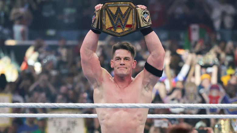 John Cena celebrates after his victory over Cody Rhodes to win the Undisputed WWE Championship during WrestleMania 41