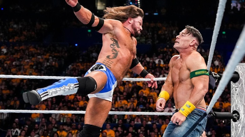 AJ Styles clashing with John Cena during their Crown Jewel 2025 match.