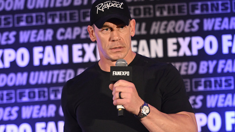 John Cena speaking on stage during the Fan Expo Chicago 2025.