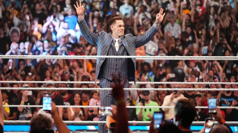 John Cena poses for the WWE crowd before making his John Cena Classic announcement at WWE Backlash 2026.