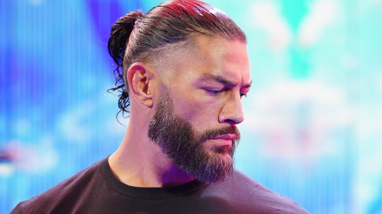 Roman Reigns looking over his shoulder