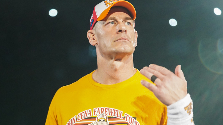 John Cena wearing an orange shirt