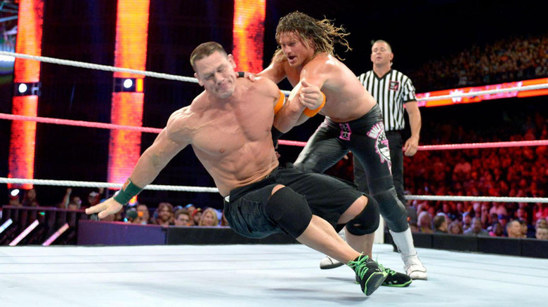 John Cena delivers an arm drag to Dolph Ziggler
