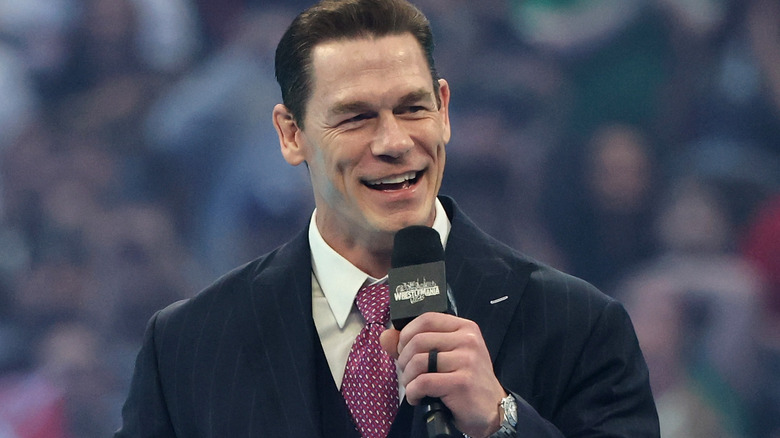 John Cena holding a microphone