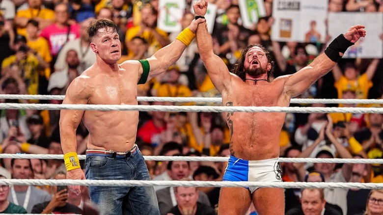 John Cena and AJ Styles after their match