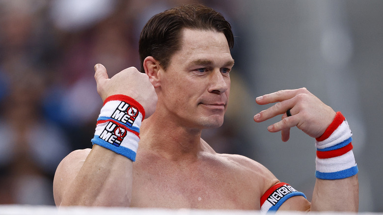 John Cena doing something with his hands