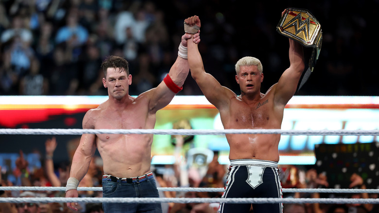 John Cena congratulates Cody Rhodes after Rhodes won and became the WWE Undisputed Champion during the WWE 2025 SummerSlam at MetLife Stadium on August 03, 2025 in East Rutherford, New Jersey.