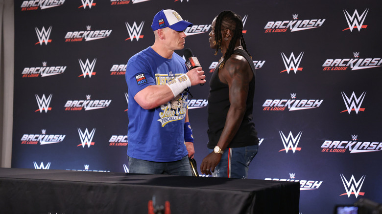 John Cena before he delivers an AA to R-Truth