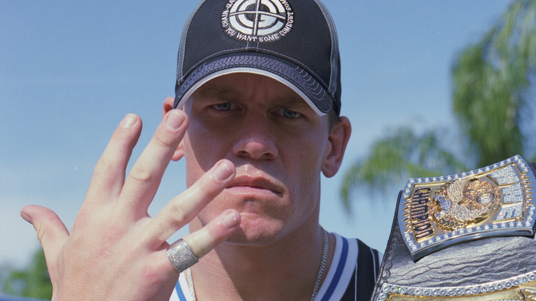 John Cena posing with the 