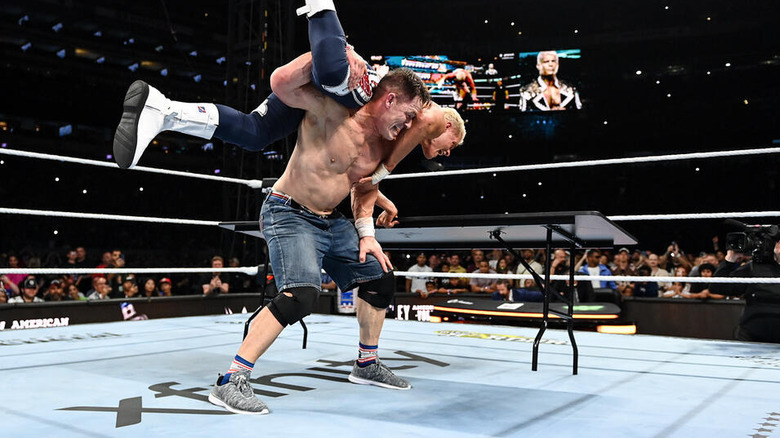John Cena tries to put Cody Rhodes through a table at WWE SummerSlam 2025