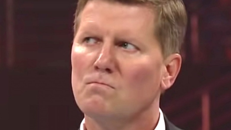 John Laurinaitis frowns