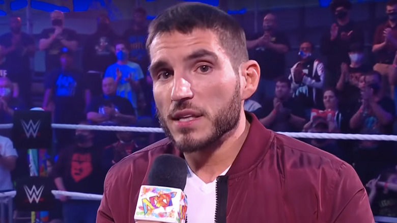 Johnny Gargano with a microphone