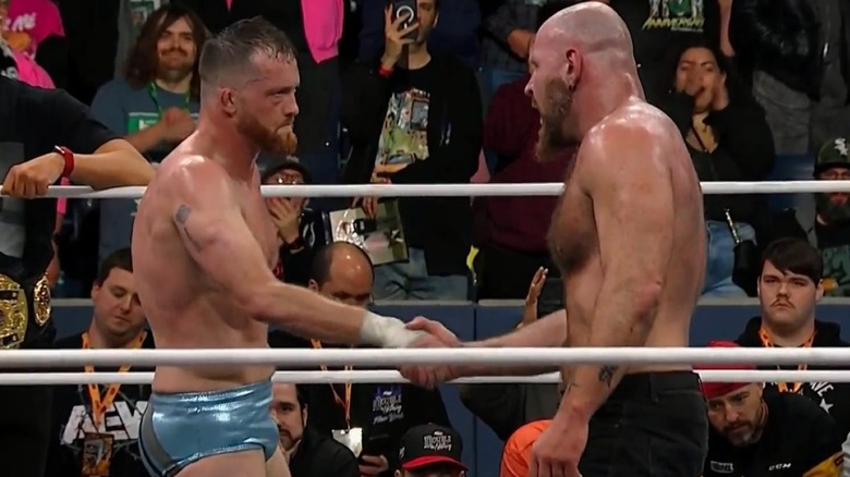 Kyle O'Reilly and Jon Moxley shake hands