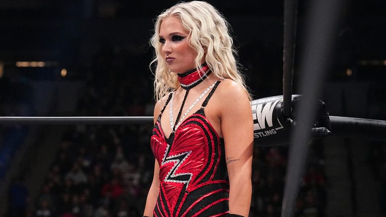 Julia Hart wearing red and black ring gear