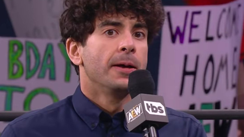 Tony Khan with a mic