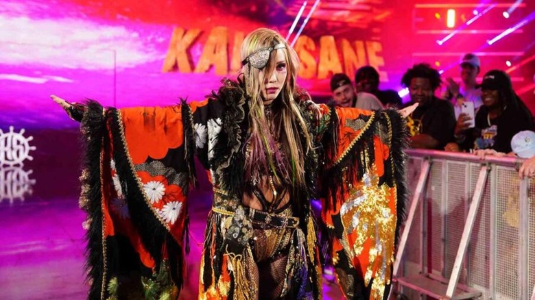 Kairi Sane poses in her pirate entrance gear on her way to the ring for a match on WWE programming.