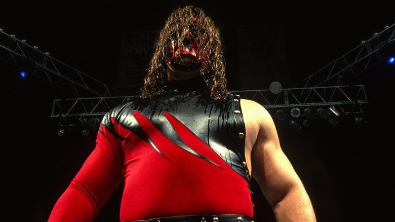 Kane standing in the ring