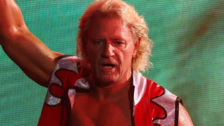 Jeff Jarrett with arm raised