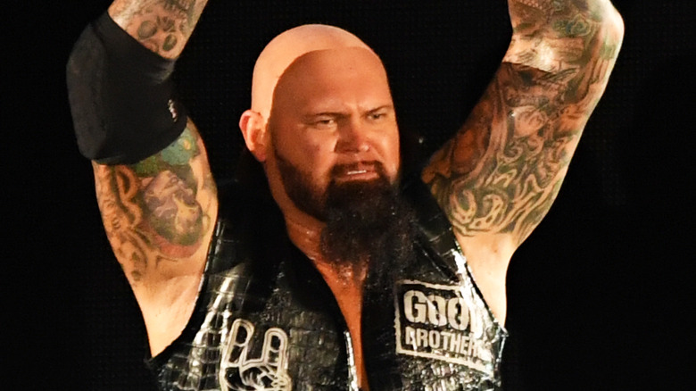 Luke Gallows arms raised