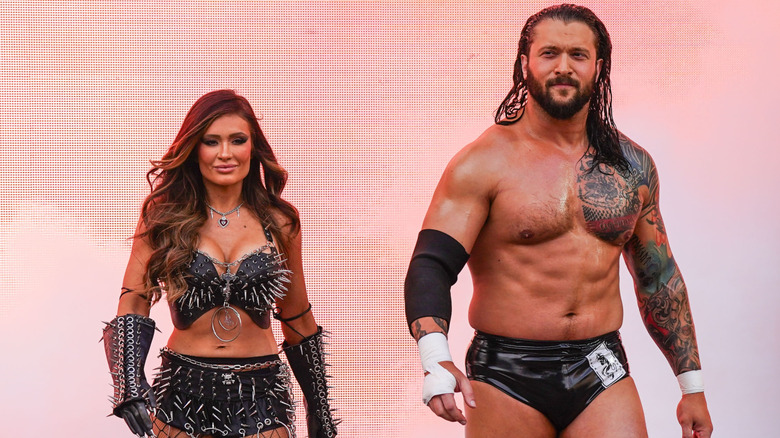 Karrion Kross and Scarlett walking