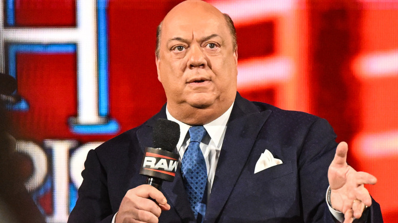 Paul Heyman holding a microphone