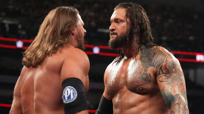 Karrion Kross and AJ Styles facing off in the ring