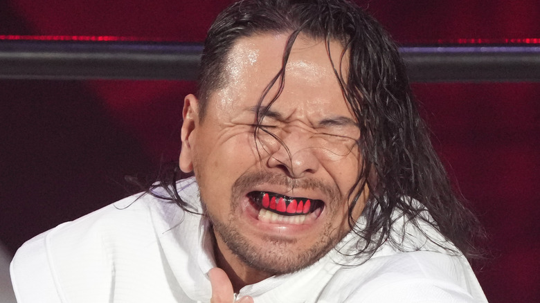 Shinsuke Nakamura poses