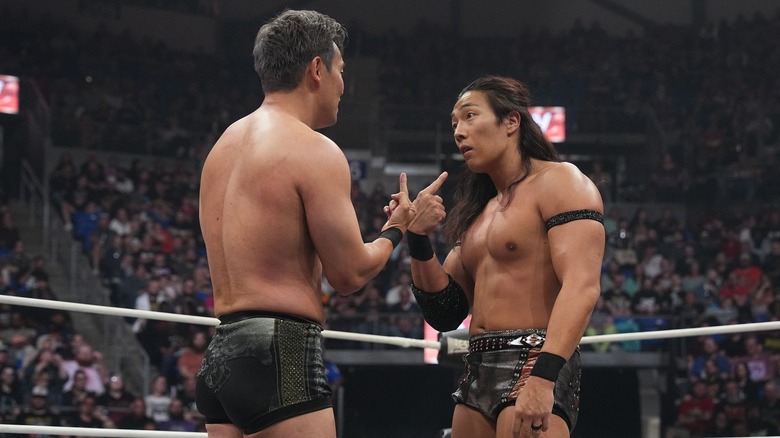 Kazuchika Okada and Konosuke Takeshita argue in the ring