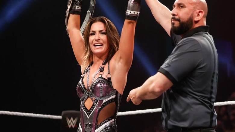 A referee holds up the arm of Kendal Grey after she won the Women's Iron Survivor Challenge at Deadline 2025.