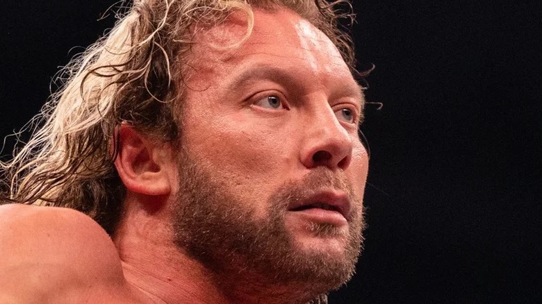Kenny Omega Looks On During An AEW Match