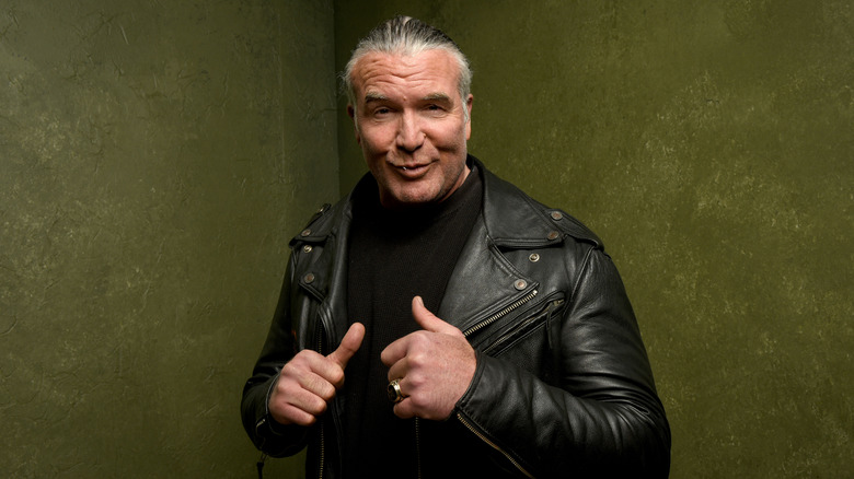 Scott Hall gives himself two thumbs up