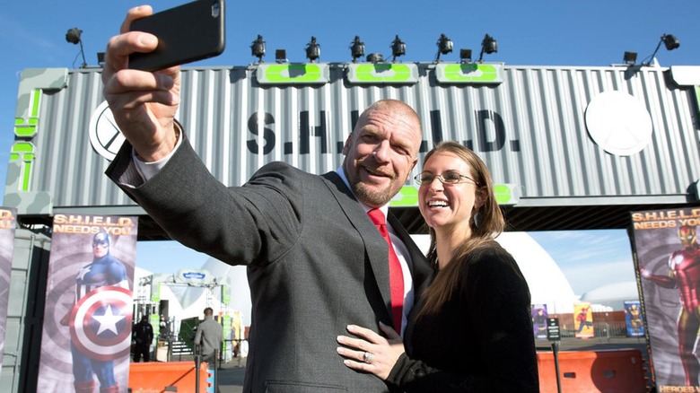 Triple H And Stephanie McMahon Pose At An Event