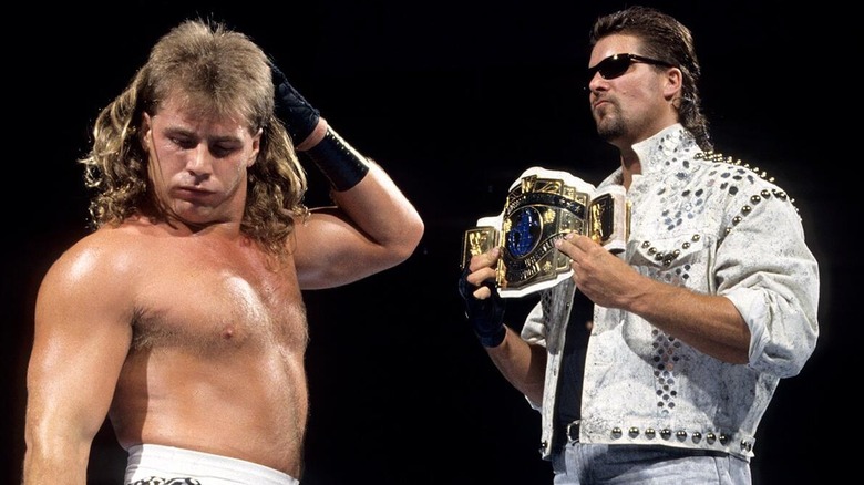 Shawn Michaels and Kevin Nash posing with the WWE Intercontinental Championship during the early stages of their pairing.