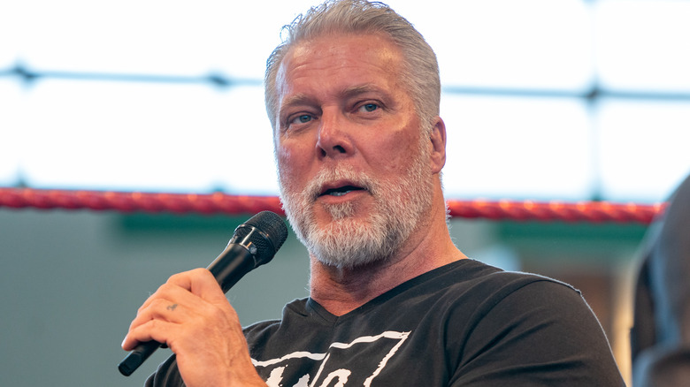 Kevin Nash with a beard doing an interview