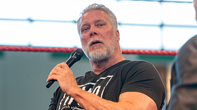 Kevin Nash listens to a question