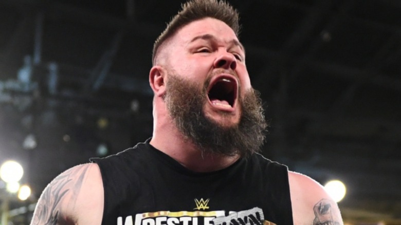 Kevin Owens lets out a celebratory yell