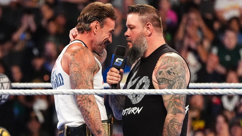 Kevin Owens goes face-to-face with Undisputed WWE Champion CM Punk while cutting a promo in the ring on the August 14, 2026 edition of 