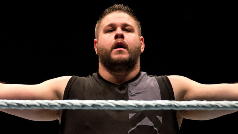 Kevin Owens does big arms