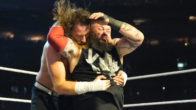 Kevin Owens hits a Stunner on Sami Zayn in the ring during their unsanctioned match at WWE Elimination Chamber 2025.