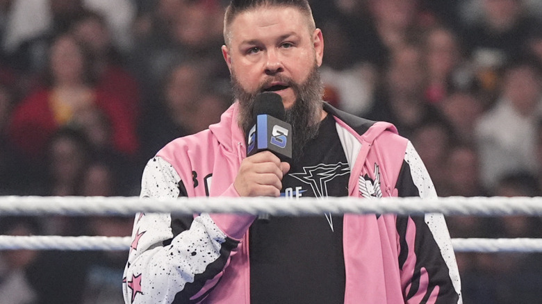 Kevin Owens cutting a promo on smackdown