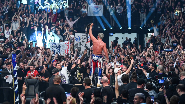Cody Rhodes celebrates with fans at WWE Backlash